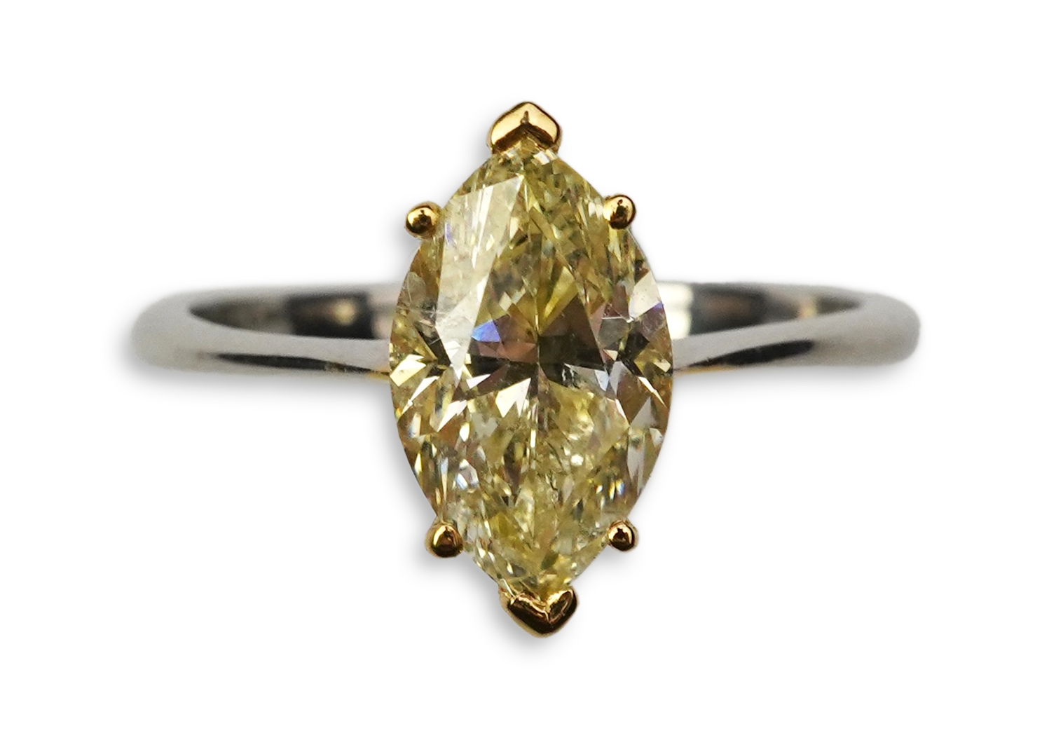 A yellow diamond solitaire ring